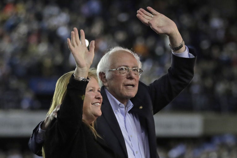 Democratic presidential candidate Sen. Bernie Sanders, I-Vt., waves with his wife, Jane, after his speech at a campaign event in Tacoma, Wash., on Feb. 17. (Drew Angerer/Getty Images)