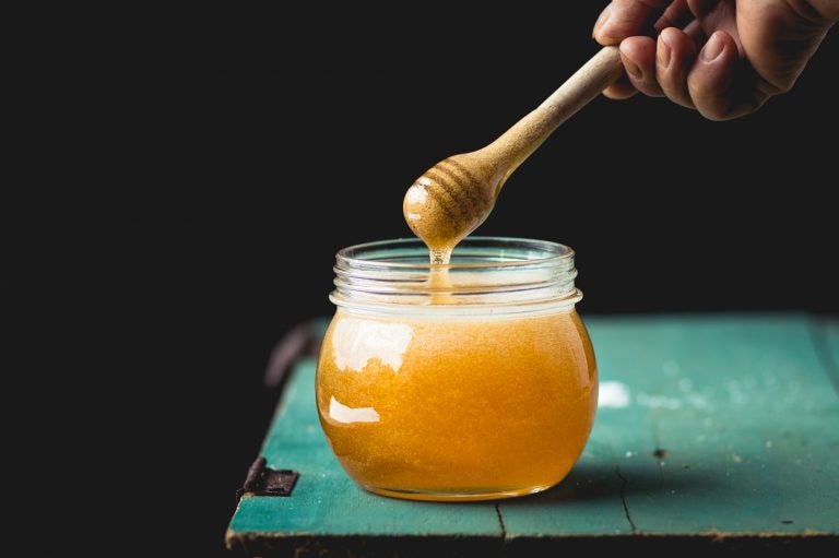 A spoonful of honey makes the medicine...irrelevant. That's because honey works better than cough syrups to help with kids' coughs. (Rachen Buosa/Getty Images/EyeEm)