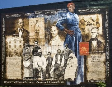 A mural on Germantown Avenue celebrates Harriett Tubman and other heroes of the Underground Railroad. (Mural Arts/ Painting by Sam Donovan, Photo by Jack Ramsdale) 