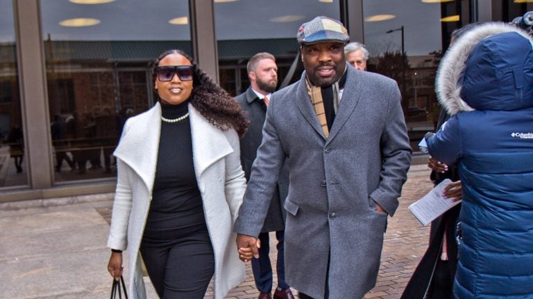 City Councilmember Kenyatta Johnson and his wife, Dawn Chavous, exiting federal court