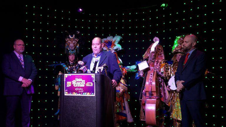 John Pignotti (center) discusses self policing on blackface issue as members of the Quaker City String Band Look on (Tom MacDonald/WHYY)