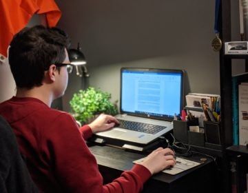 Thomas Duliban working on his laptop. (courtesy of author)