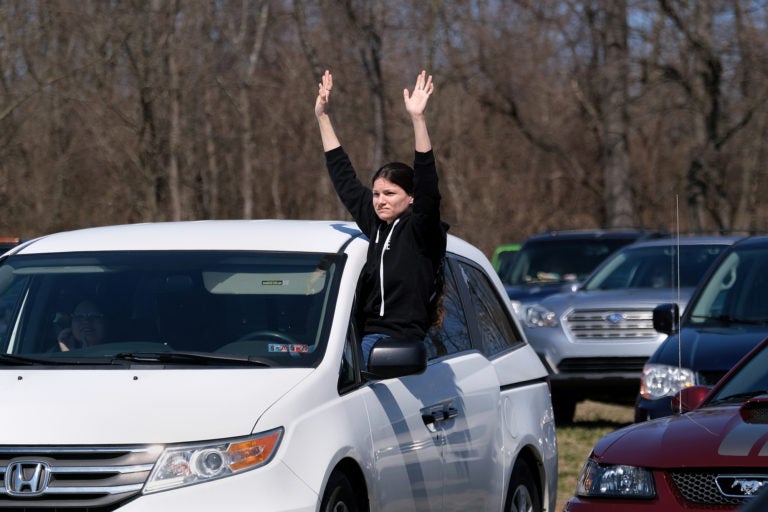 A parishioner during Bethany Wesleyan Church's Sunday worship service at Becky's Drive-In in Walnutport, Pennsylvania. (Matt Smith for Keystone Crossroads)