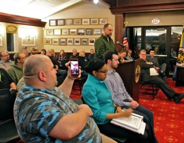 Second Amendment advocate Josh Finnical speaks during a Cumberland County freeholder meeting in support of a pro-gun rights resolution. (Emma Lee/WHYY)