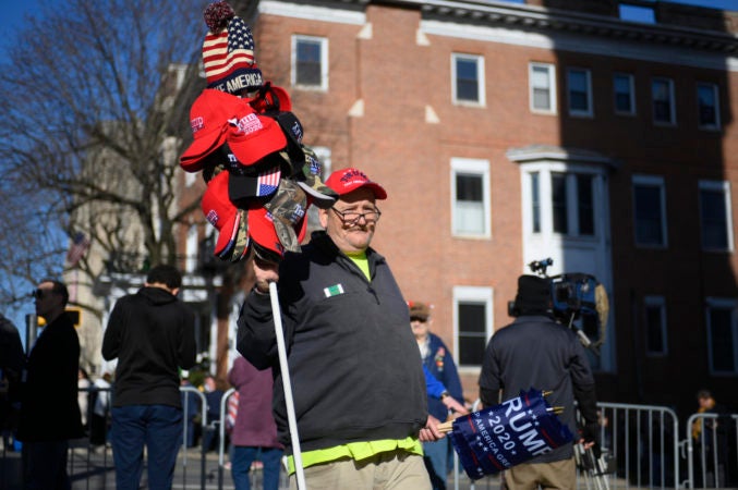 A street vendor hawks Trump merchandise ahead of a televised town hall in Scranton, Pa. on Thursday  (Bastiaan Slabbers for Keystone Crossroads)