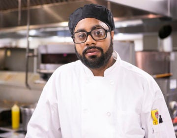 Chef Terrick Hubbard poses for a picture at a kitchen in Camden on Monday, March 9, 2020. (Miguel Martinez for WHYY)