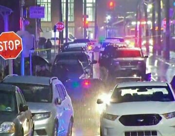 Police converge on Bridge Street in Philadelphia's Frankford neighborhood, where a police officer was shot and killed while serving a warrant. (NBC10)