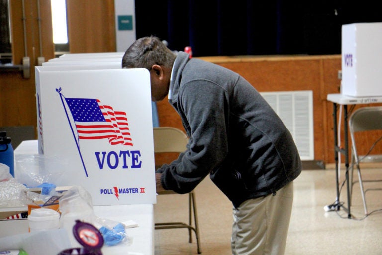 A voter fills out a ballot at Cecelia Snyder Middle School in Bensalem during a special election to choose a new member of the Pennsylvania House of Representatives in March 2020. (Emma Lee/WHYY)