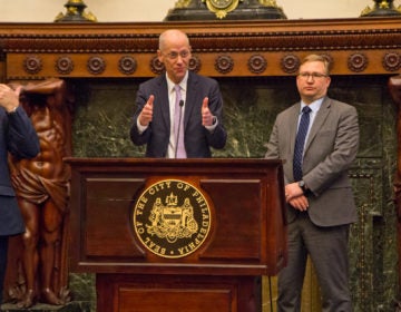 Philadelphia Health Commissioner Dr. Thomas Farley and Managing Director Brian Abernathy urge Philadelphians to avoid large public gathers at a press conference announcing the first confirmed case of COVID-19 in the city. (Kimberly Paynter/WHYY)