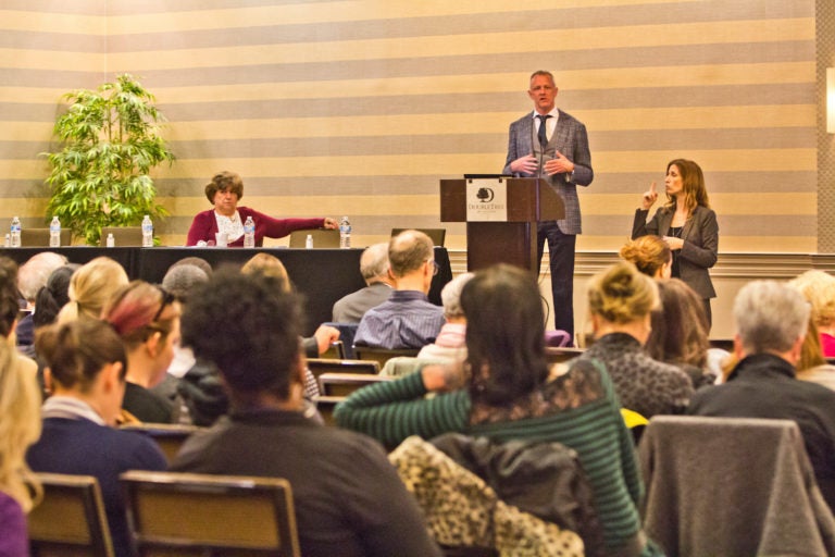 Dr. Steve Alles, director of disease control at the Philadelphia Department of Health, addresses the health care community at a COVID-19 symposium on Wednesday. (Kimberly Paynter/WHYY)