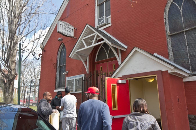 New Kingdom Baptist Church has committed to giving hot meals to anyone in the community as long as schools are closed. This week, it's averaged about 200 meals each day. (Kimberly Paynter/WHYY)