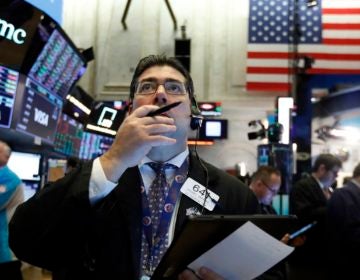 Trader Michael Capolino works on the floor of the New York Stock Exchange, Tuesday, March 3, 2020. Stocks are opening lower on Wall Street after the Group of Seven countries held off on giving the global economy new stimulus to help it cope with the coronavirus outbreak. (AP Photo/Richard Drew)