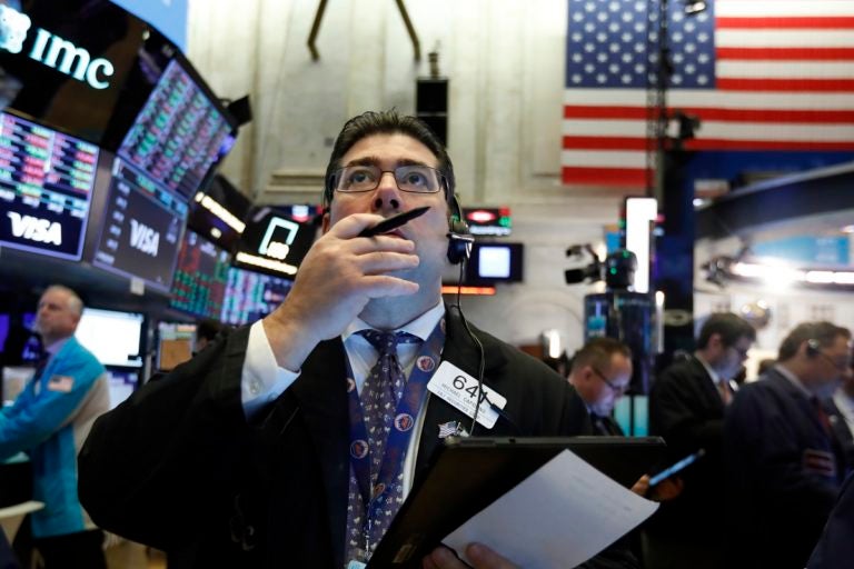 Trader Michael Capolino works on the floor of the New York Stock Exchange, Tuesday, March 3, 2020. Stocks are opening lower on Wall Street after the Group of Seven countries held off on giving the global economy new stimulus to help it cope with the coronavirus outbreak. (AP Photo/Richard Drew)