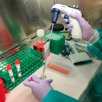 In this Feb. 6, 2020, photo released by the California Department of Public Health, is a demonstration of the equipment and procedures that will be used at the department's Viral and Rickettsial Disease Laboratory lab in Richmond, Calif., to conduct tests for novel coronavirus. This is not an actual test of a novel coronavirus specimen. (California Department of Public Health via AP)