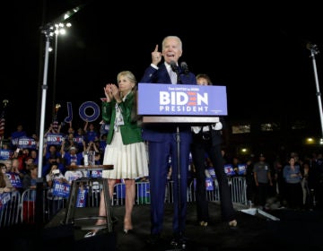 Democratic presidential candidate former Vice President Joe Biden speaks, next to his wife Jill during a primary election night rally Tuesday, March 3, 2020, in Los Angeles. (AP Photo/Marcio Jose Sanchez)