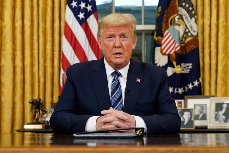 President Donald Trump speaks in an address to the nation from the Oval Office at the White House about the coronavirus Wednesday, March, 11, 2020, in Washington. (Doug Mills/The New York Times via AP, Pool)