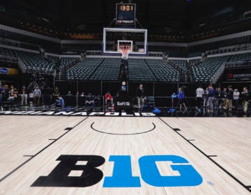 The seating area and court at Bankers Life Fieldhouse is shown in Indianapolis, Thursday, March 12, 2020, after the Big Ten Conference announced the remainder of the men’s tournament is cancelled,  effective immediately. (AP Photo/Michael Conroy)