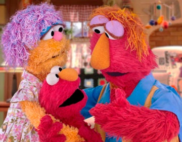 This undated image provided by Sesame Workshop shows Elmo and his parents Louie and Mae. Sesame Workshop announced Monday, March 30, 2020, that Elmo, Rooster and Cookie Monster are featured in some of four new animated public service spots reminding young fans to take care while doing such things as washing hands and sneezing. The content, which will be translated into 19 languages, is part of Sesame Workshop's Caring for Each Other initiative to help families stay physically and mentally healthy during the coronavirus pandemic. (Sesame Workshop via AP)
