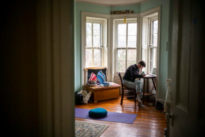 Michaela Prell, Riley's sister, is a senior at Sarah Lawrence College. She set up a make-shift desk in her old bedroom since school shut down. (Jessica Kourkounis for Keystone Crossroads)