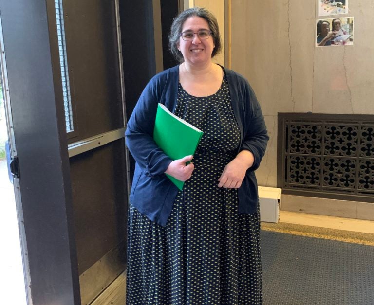 Parent Jaime Longo with her learning packet at Houston elementary school. (Dale Mezzacappa/The Notebook)