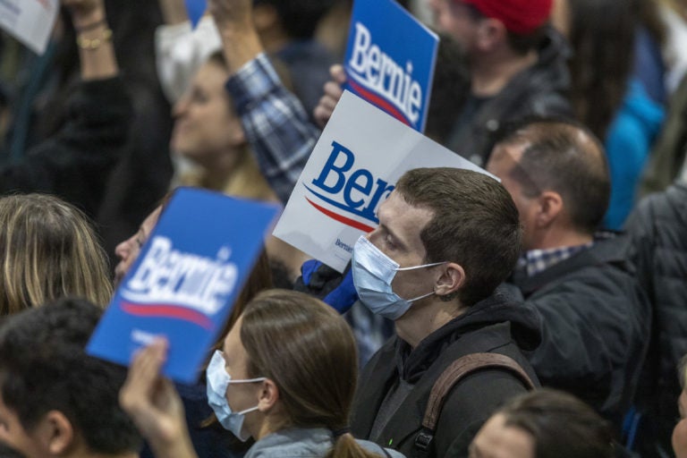 Supporters wear medical masks, as fears of coronavirus increase in California, during a campaign rally for Presidential candidate Sen. Bernie Sanders in Los Angeles on March 1, 2020. (David McNew/Getty Images)