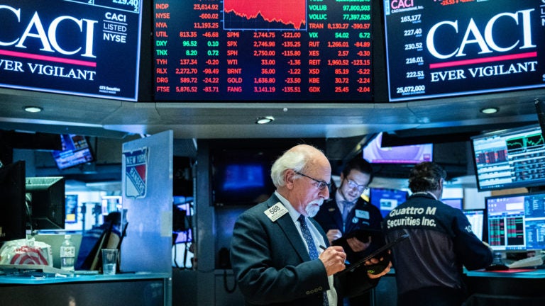 After weeks of turmoil over the economic toll of the coronavirus, U.S. stock indexes entered a bear market, signaling an end to their 11-year winning streak. (Jeenah Moon/Getty Images)