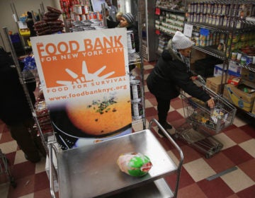 The legislation includes $450 million to boost inventories at the nation's food banks, which are already hurting from increased demand. (John Moore/Getty Images)