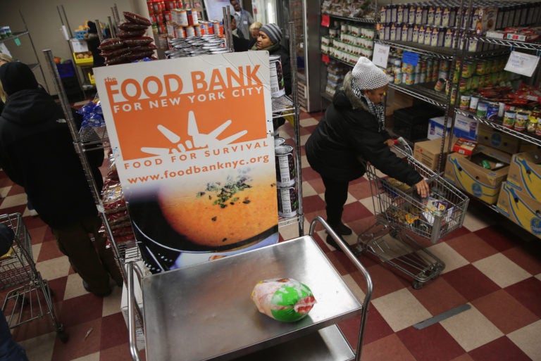 The legislation includes $450 million to boost inventories at the nation's food banks, which are already hurting from increased demand. (John Moore/Getty Images)