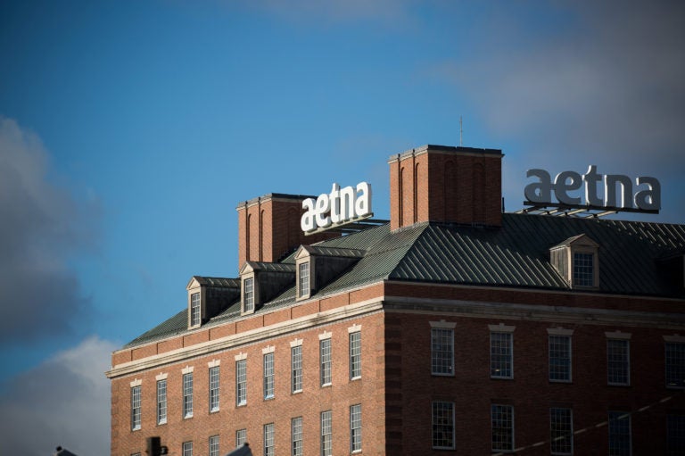 Aetna was the first insurer to announce its plan to help shield patients with COVID-19 from high medical bills. But out-of-network charges and other surprise bills remain a risk, say advocates for patients.  (Michael Nagle/Bloomberg via Getty Images)