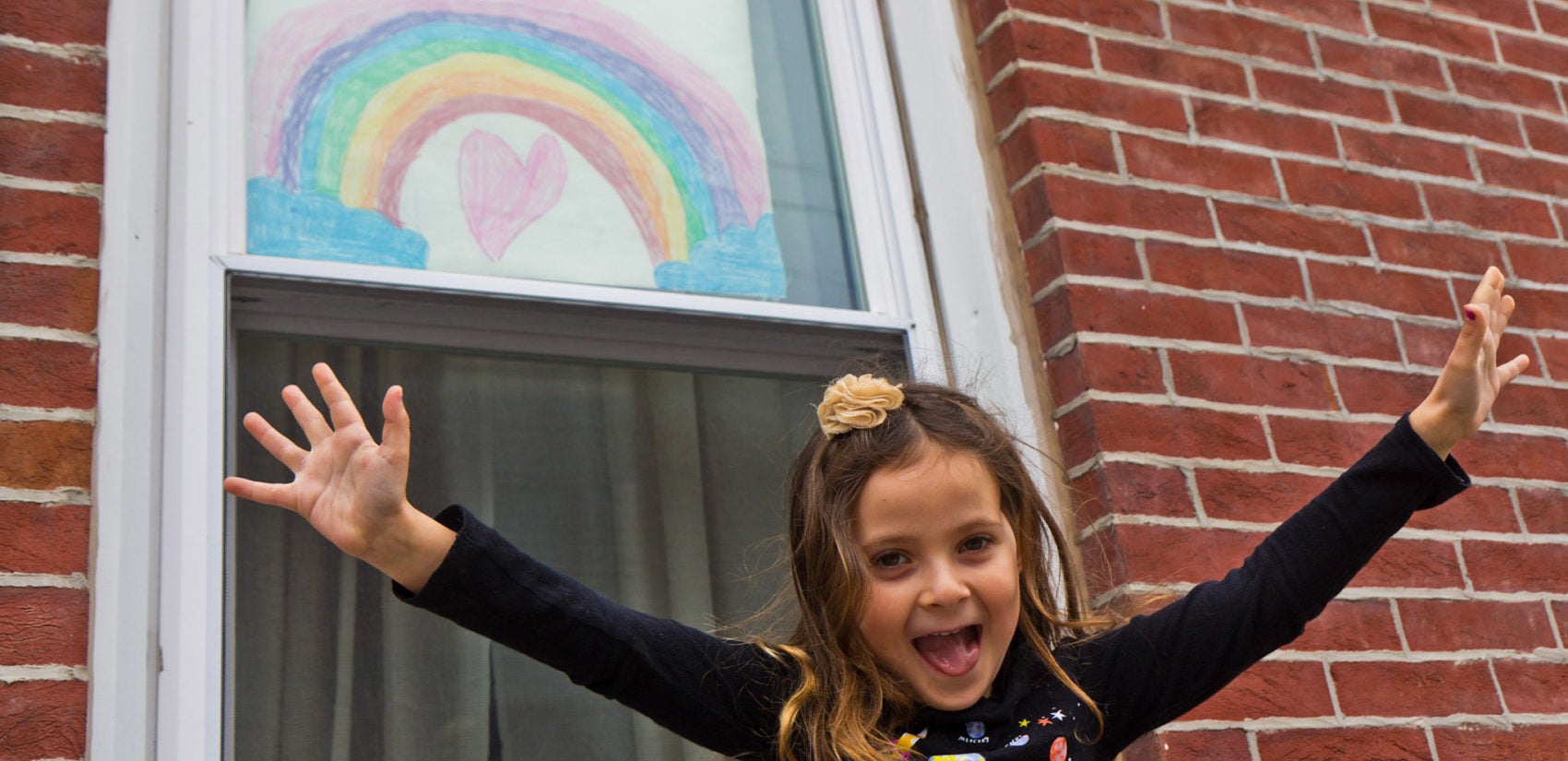 Bowie Moon Porter drew this rainbow for other kids on the rainbow hunt through Philadelphia’s Fishtown neighborhood. (Kimberly Paynter/WHYY)