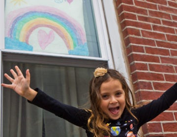 Bowie Moon Porter drew this rainbow for other kids on the rainbow hunt through Philadelphia’s Fishtown neighborhood. (Kimberly Paynter/WHYY)