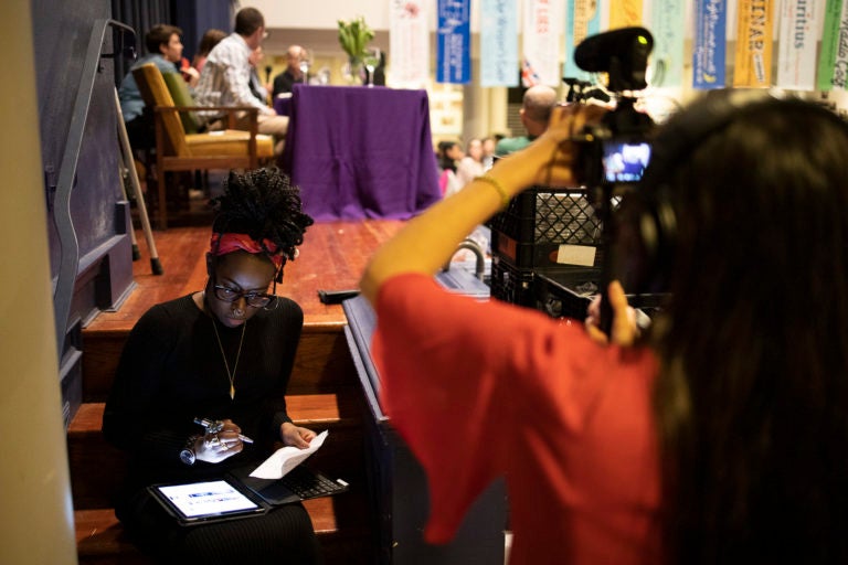 Melissa filming The People's Supper event at FUMCOG, hosted by South Philly Barbacoa (2019).  (Ryan Collerd)