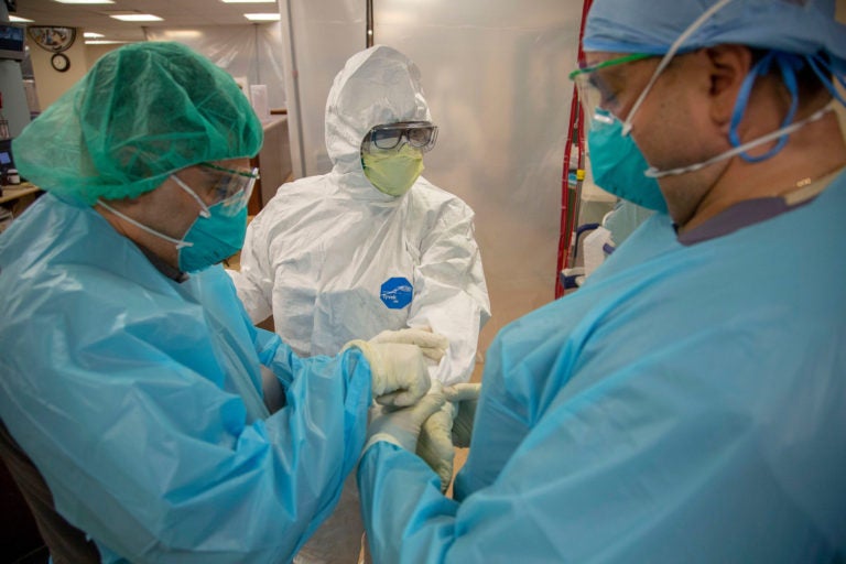 Medical personnel put on protective cloting at Holy Name Medical Center in Teaneck, New Jersey, March 24, 2020. (Jeff Rhode/Holy Name Medical Center)