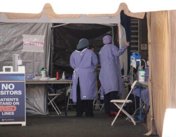 A tent outside the the emergency room at the University of Pennsylvania allows patients to be screened for COVID-19 before they enter the building. (Emma Lee/WHYY)