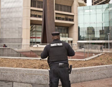Transit police stand outside the Clothes Pin in Center City. (Kimberly Paynter/WHYY)