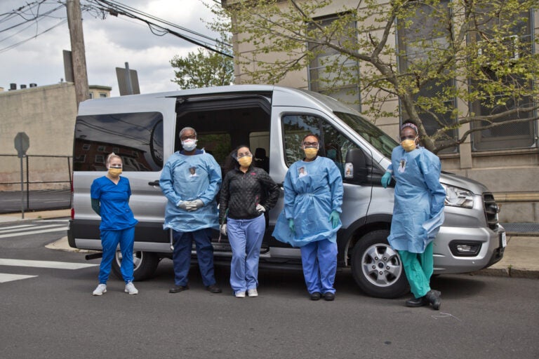 Dana Heller, 3rd medical student, Dr. Pierre Chanson, Natalie Gonzalez, 4th year medical student, Dr. Renell Dupree, and Dr. Ala Stanford, are part of the Black Doctors COVID-19 consortium. They are taking mobile testing at-risk zip codes in Philadelphia. (Kimberly Paynter/WHYY)