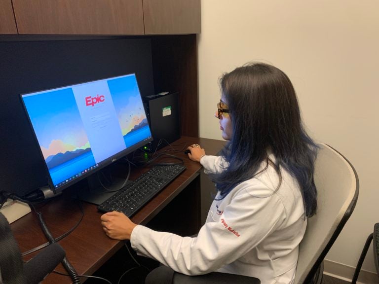 Dr. Aditi Joshi, director of JeffConnect, Thomas Jefferson University Hospital’s telehealth platform, opens EPIC, the
hospital's electronic medical records program.  That way she can look
up at patient's history and see scans and other test
results before meeting with them virtually. (Courtesy of Aditi Joshi)