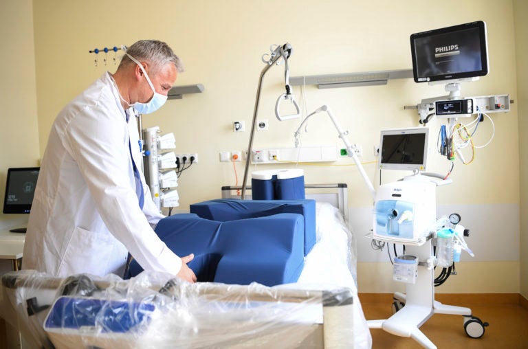 Preparing for COVID-19 intensive care patients (Photo by: Britta Pedersen/AP Images)