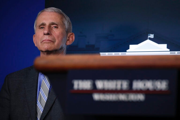 Dr. Anthony Fauci, director of the National Institute of Allergy and Infectious Diseases, listens during a briefing about the coronavirus in the James Brady Press Briefing Room of the White House, Wednesday, April 8, 2020, in Washington. (AP Photo/Alex Brandon)