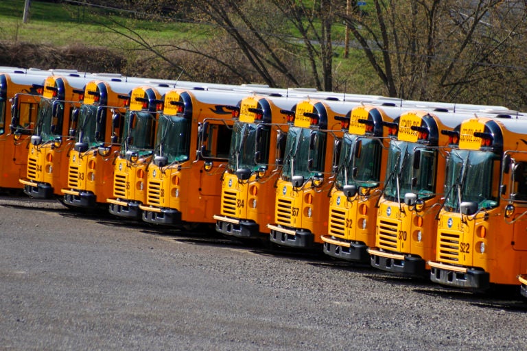 School buses are parked at a depot Thursday, April 9, 2020, in Zelienople, Pa. (AP Photo/Keith Srakocic)