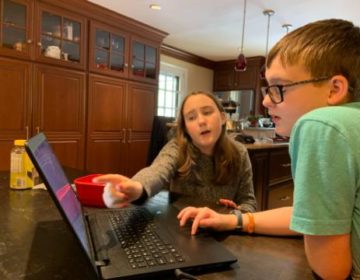 In the Kauffman household in Radnor, sister Shelby helps out brother Jake with his school work. (Courtesy of Carrie Kauffman) 