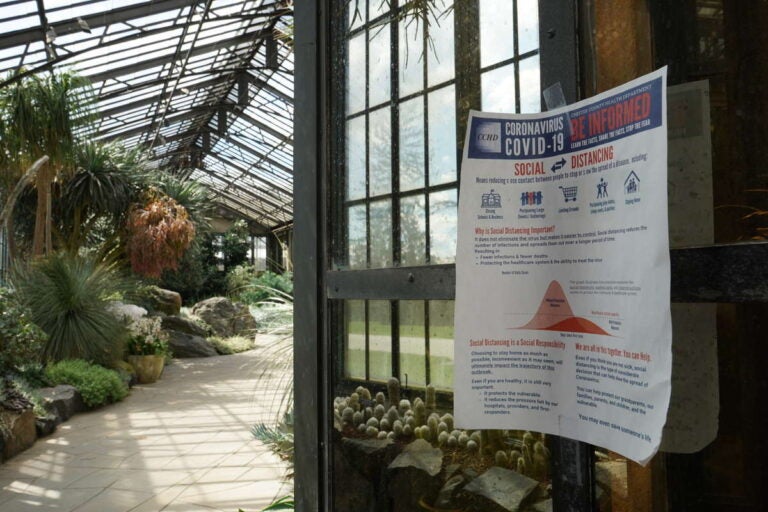 Signs are posted throughout the conservatories and in all buildings at Longwood Gardens where essential staff are working during the coronavirus shutdown. (Courtesy of Longwood Gardens/Carol Gross) 