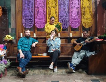  Rob Buscher (left on first row) seated with members of Calaca Flaca,Dia, the artist committee that organizes de Los Muertos altar in Fleisher's Sanctuary, the largest public event held annually at the nonprofit community art school. (Courtesy: Rob Buscher/ Photo credit: Gustavo Gonzales)