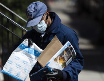 Because of the coronavirus, mail volume is down, and the U.S. Postal Service says it may run out of money by this summer. (Matt Rourke/AP)