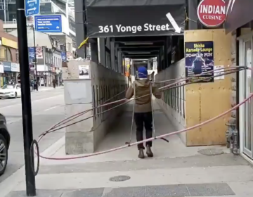 A Toronto geographer is using a large ring to study and demonstrate how difficult it is to keep a social distance of six feet in the urban environment. (Daniel Rotsztain)