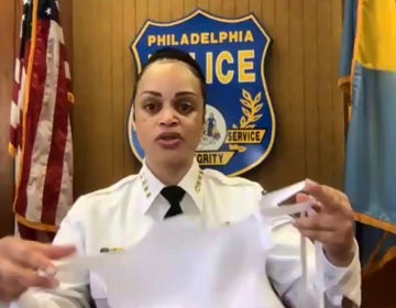 PPD Commissioner Danielle Outlaw holds up one of the temporary masks being used by dispatch workers. (Zoom Screenshot)