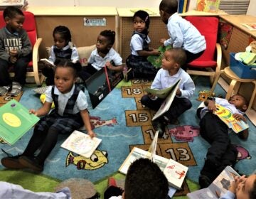 Kids gather to read at Xavier's Family Childcare.