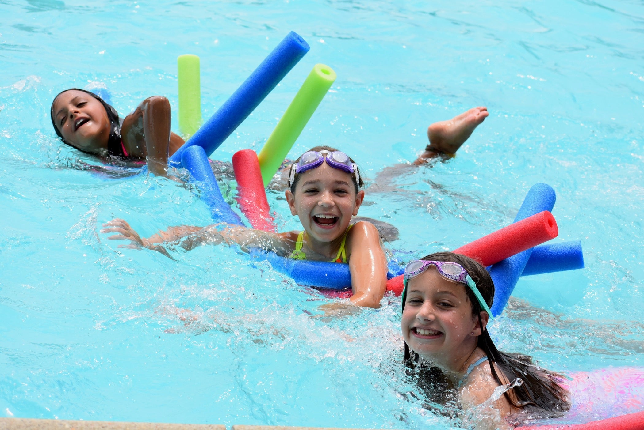 Campers swim at Liberty Lake Day Camp in Mansfield Township, N.J.