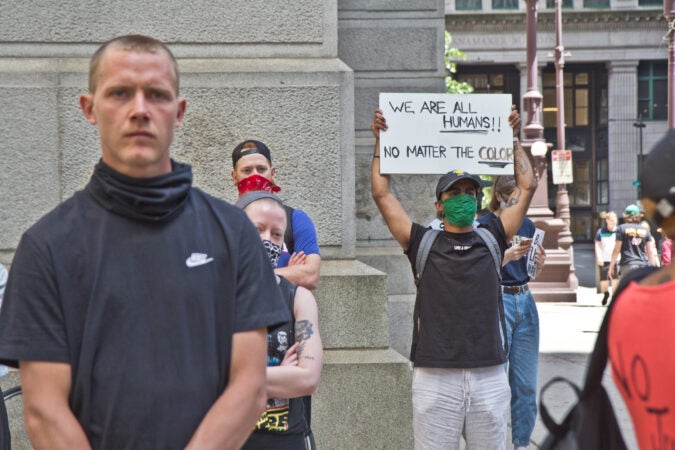 Protesters peacefully called for systemic change in the U.S. after a night of riots throughout the country.