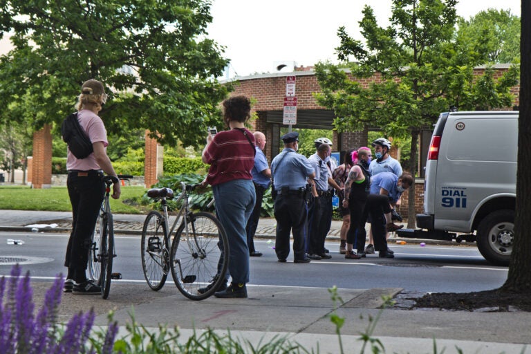 Police arrest a protester next to Independence Mall on Sunday afternoon. (Kimberly Paynter/WHYY)